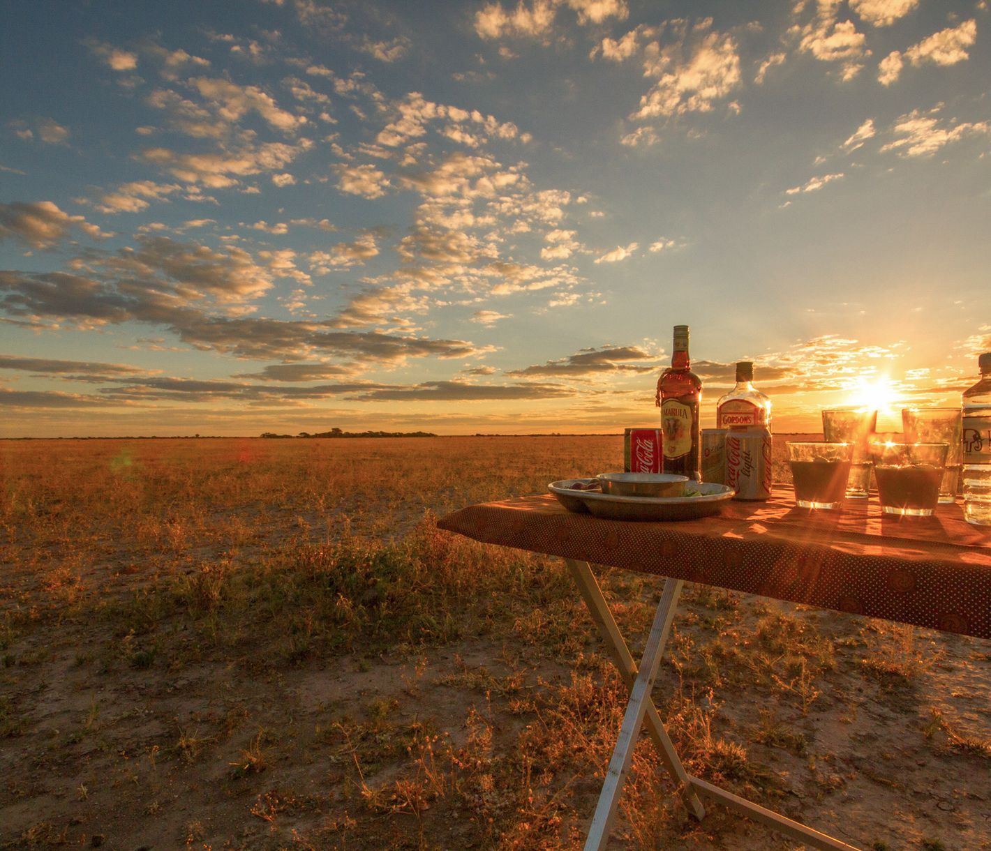 Sundowner nach einer erfolgreichen Pirschfahrt