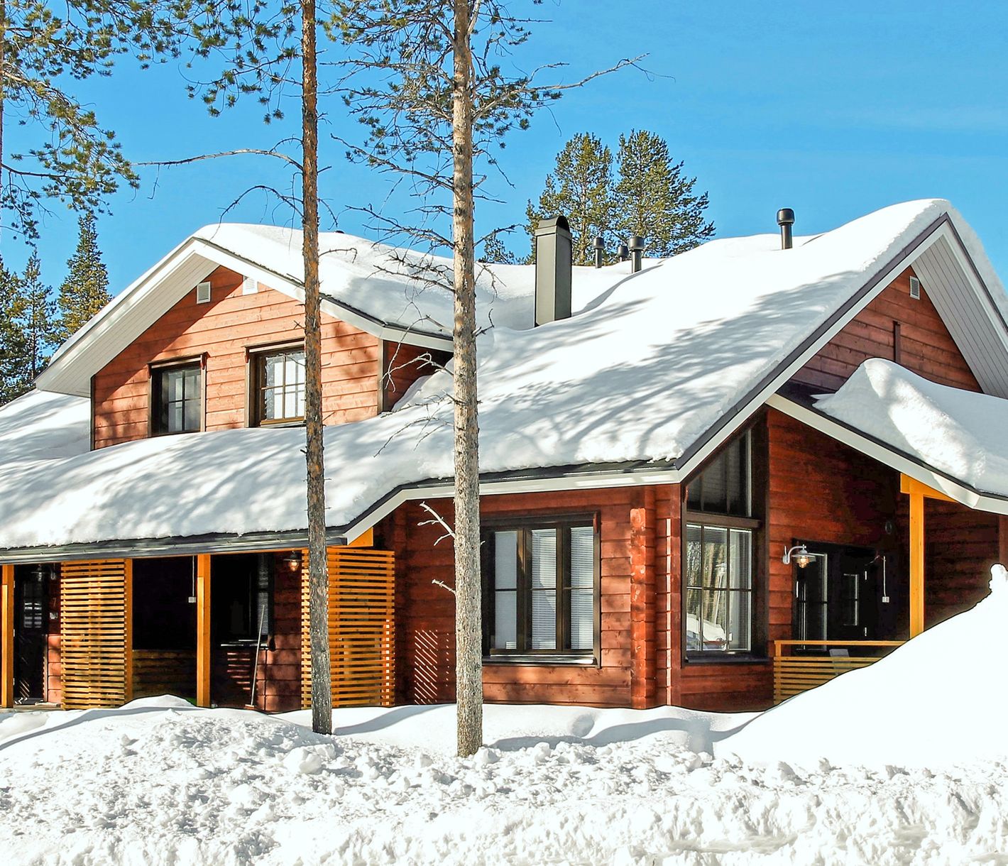 Villa Sointu - Modernes Blockhaus aus zwei Doppelhaushälften