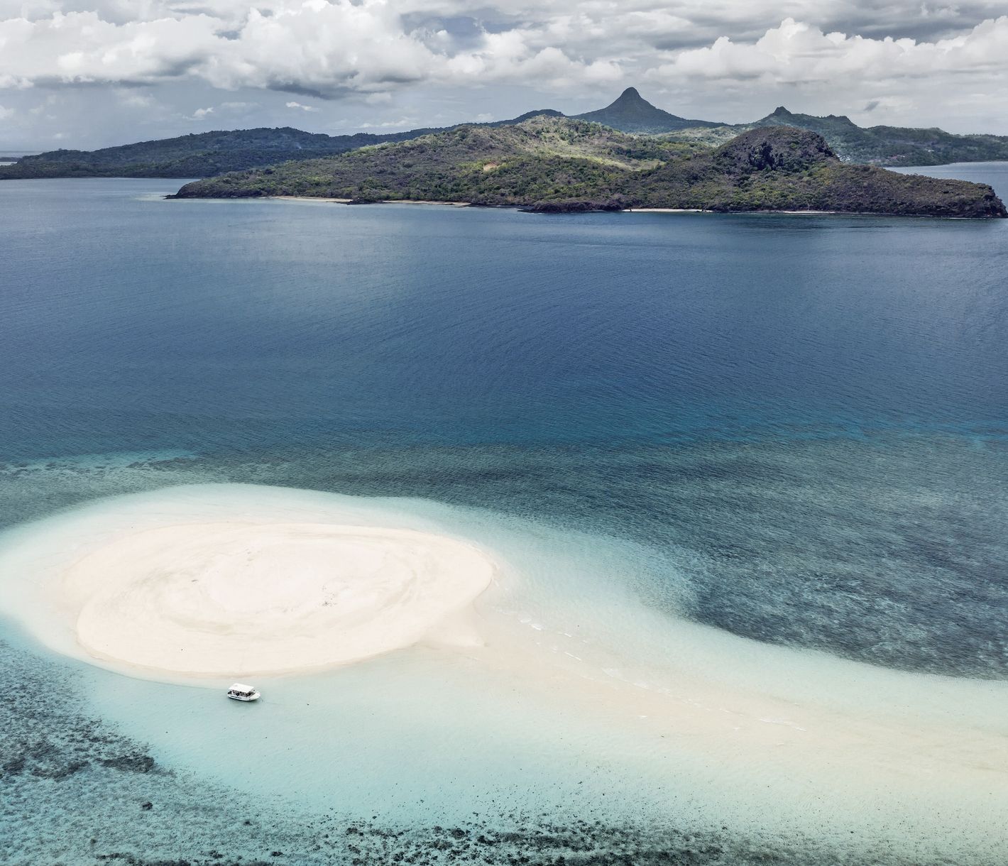 Îlot de sable blanc, entre rêve et réalité