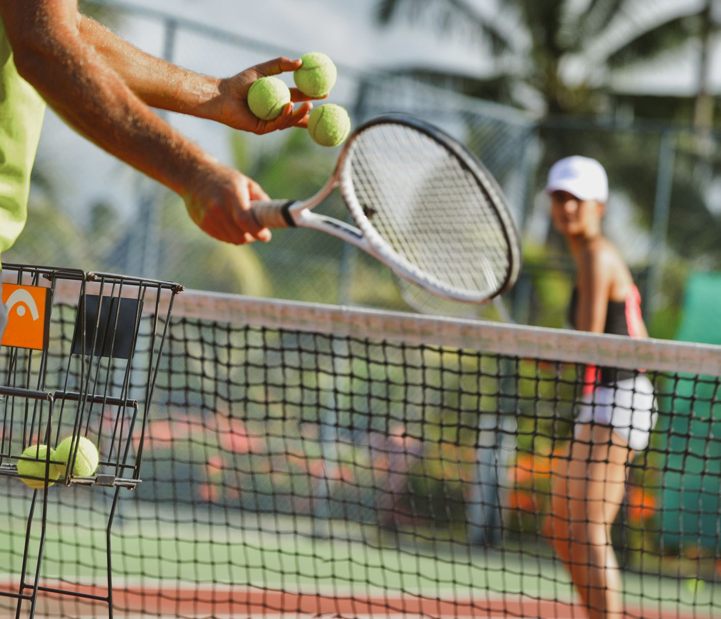 Tennis unter Palmen – im Trou aux Biches Beachcomber Golf Resort & Spa trifft Spielspass auf tropisches Flair.
