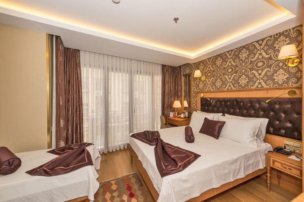 Dreibett-Zimmer