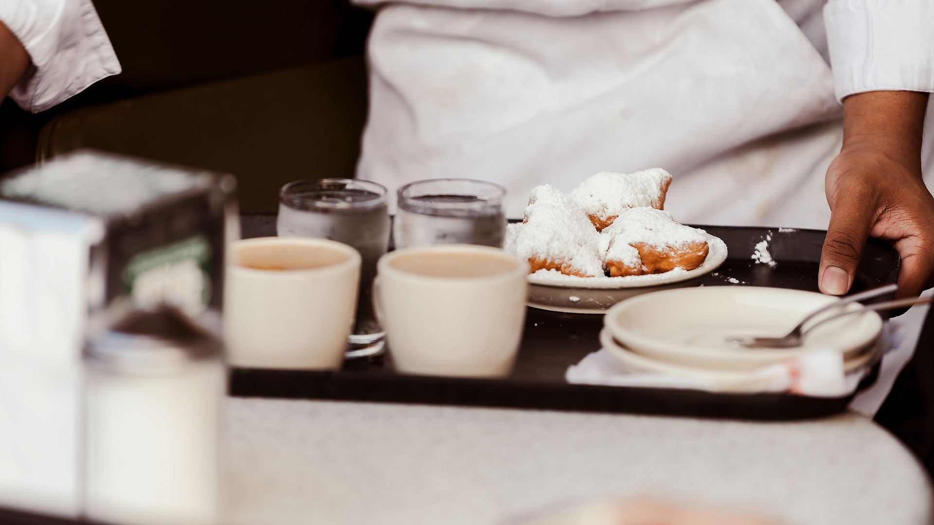 Die Beignets, ein französisches Gebäck, gehören zu einem New-Orleans-Besuch dazu.