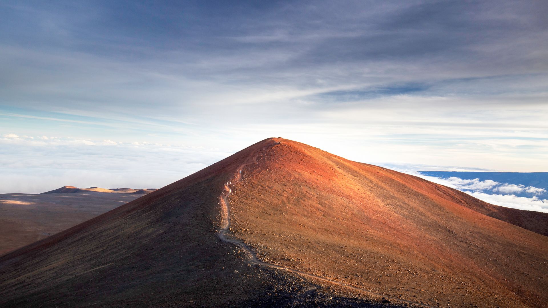 Le majestueux volcan Mauna Kea est considéré comme la plus haute montagne du monde.