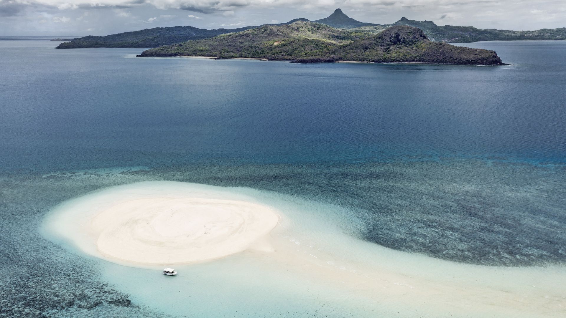 Îlot de sable blanc, entre rêve et réalité